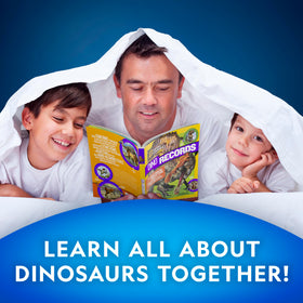Blue Marble Kids Reading with Book child studying the dinosaur activity book.