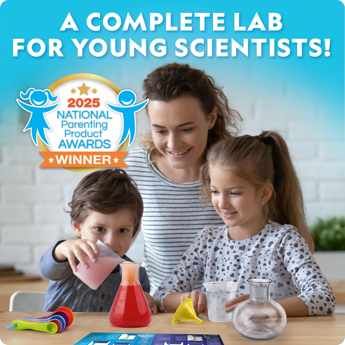 Blue Marble National Geographic Junior Chemistry Set with kids' hands using tools for hands-on experiments