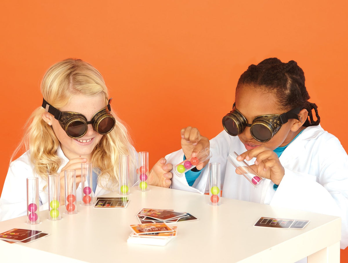 Blue Orange Dr. Eureka game setup shows a hands-on dexterity challenge.