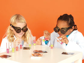 Blue Orange Dr. Eureka game setup shows a hands-on dexterity challenge.
