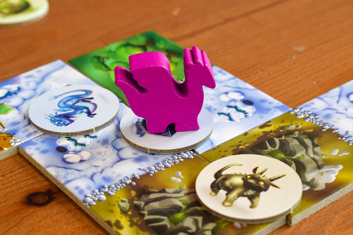 Blue Orange Dragomino egg tokens on board highlighting scoring opportunities for players.