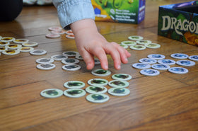 Blue Orange Dragomino starting dominoes setup aids quick rounds.