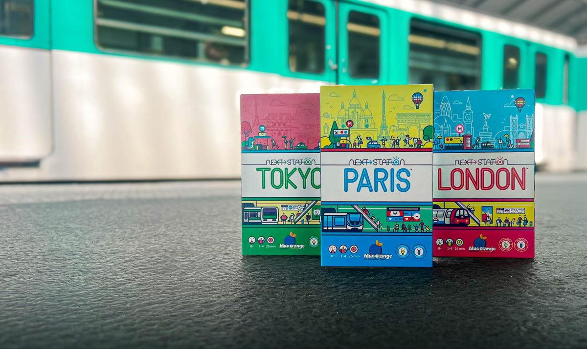 Blue Orange Next Station Paris iconic-monuments and crossings capture Parisian rail fun.