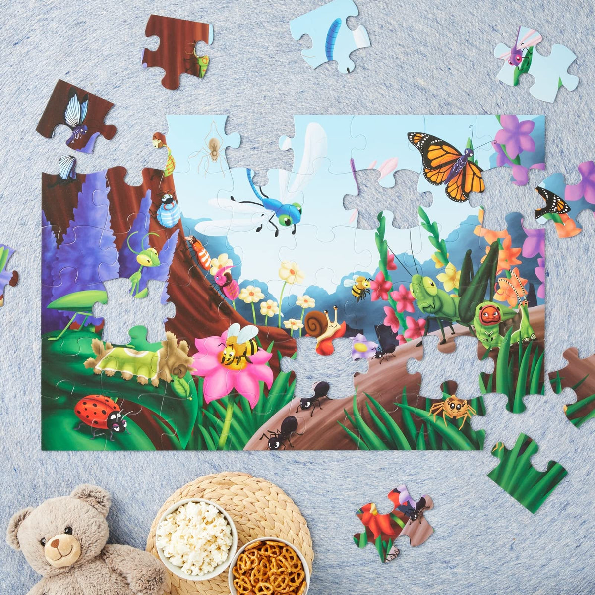 Blue Panda 48-piece bug puzzle pieces, promotes hand-eye coordination and problem solving.