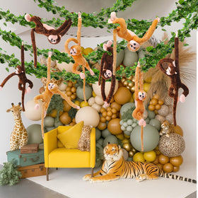 Blueweenly safari party decor brings whimsical monkey accents to birthdays and events.