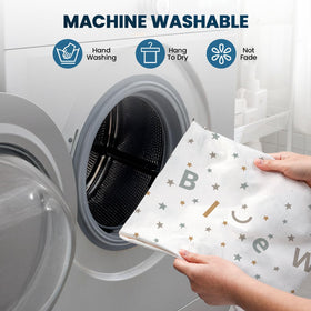 BlueWood Pikler cushion shows four zippered pockets for quick access and cleaning.