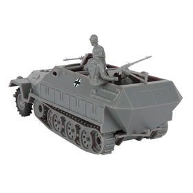 Four seated German figures accompany the gray Hanomag Halftrack for realistic play.