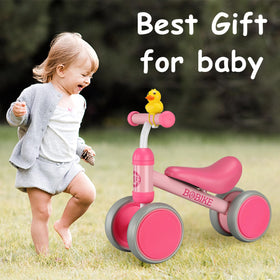 Bobike Baby Balance Bike in action: child learning indoors or outdoors with parent guidance.