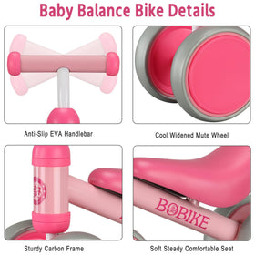Bobike balance bike Rose Red side view demonstrates easy-grip handle and kid-friendly frame.