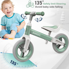 Bobike green balance bike for indoor and outdoor play.