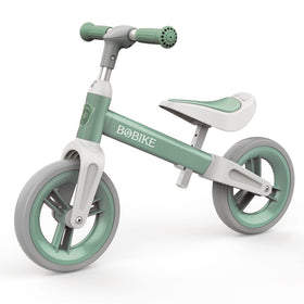 Bobike toddler balance bike green side view showing balance learning.