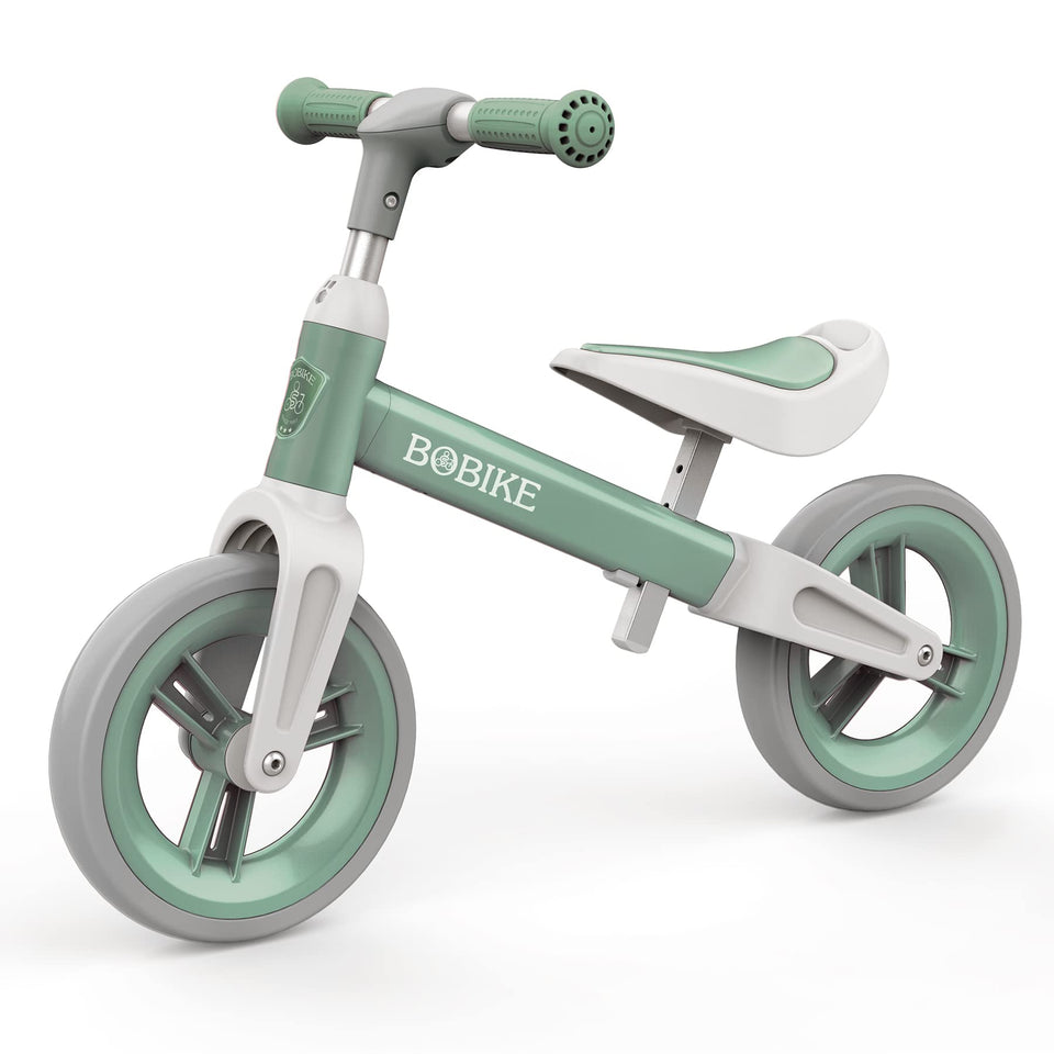 Bobike toddler balance bike green side view showing balance learning.
