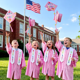 Kids wearing Bokon gear during a graduation photo session for keepsake memories
