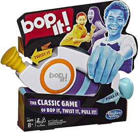 Bop It! electronic game unit for quick reflex challenges during family game night.