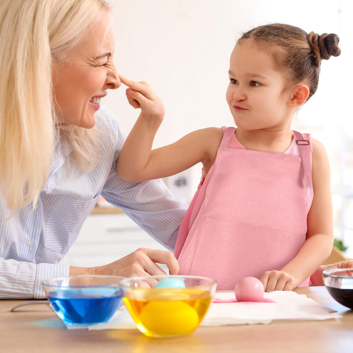 BOUBONI pink kids apron dries quickly and is reusable for future sessions.