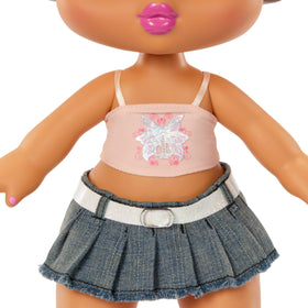 Yasmin's two-pigtail hairstyle with colorful beads supports creative styling play.