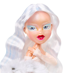 Cloe with blue eyeshadow and white lashes, frosty makeup detail for photography.