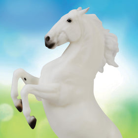 Breyer Pluto Gratia dressage ambassador sculpture capturing upper-level movements inspiration.