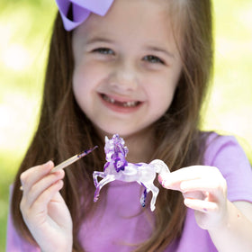 Breyer Stablemates paintbrush with models demonstrates beginner-friendly painting