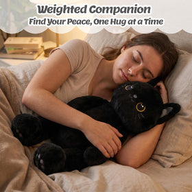BRICHOEE weighted black cat plush resting on lap for calming support