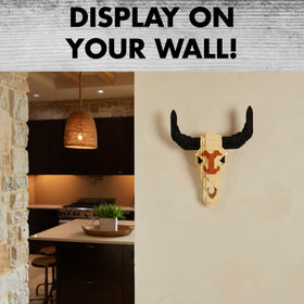 Brickcraft steer skull wall mount on rustic backdrop.
