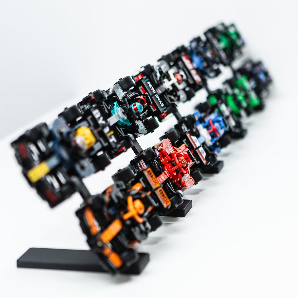 Brickify Speed Champions F1 stand expanded with other Brickify displays for more models.