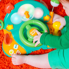 Bright Starts dashboard with activities supports fine motor skills during play sessions