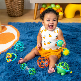 Bright Starts Little Shakers Oball Shaker Toy with flexible material and finger holes