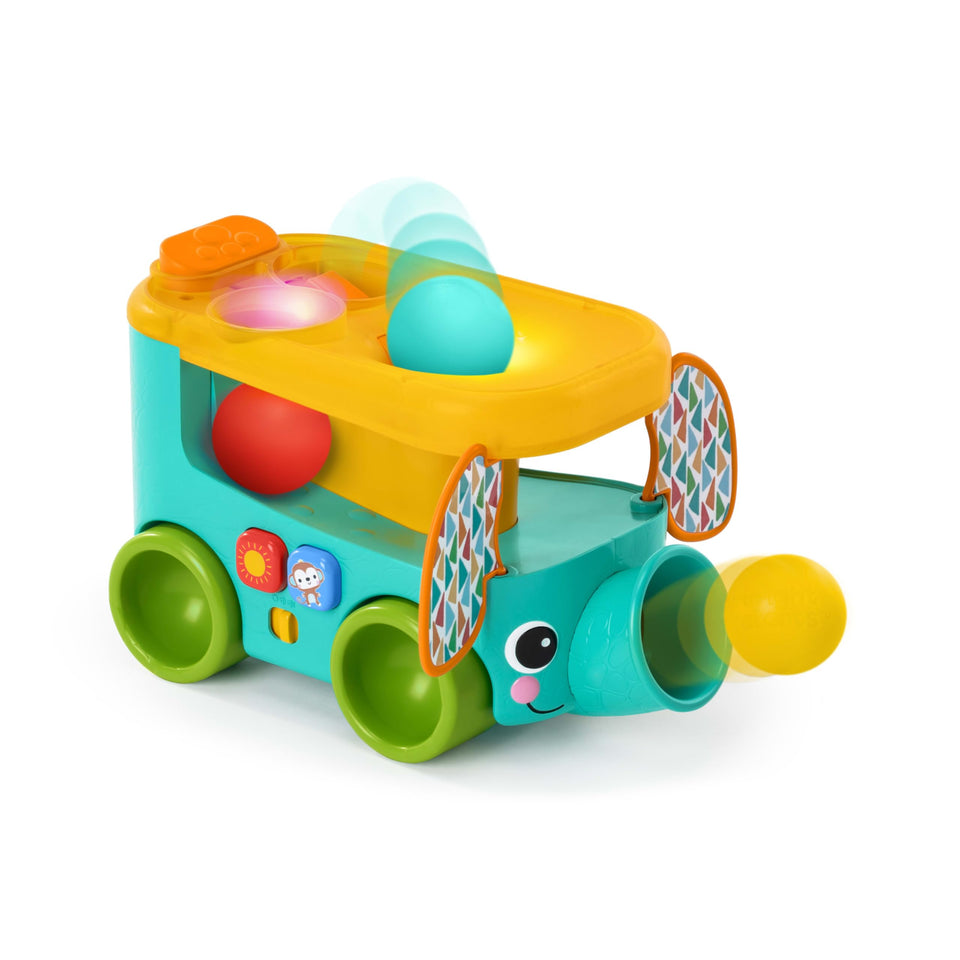 Bright Starts Safari Bus top holes for ball drops to boost fine motor skills.