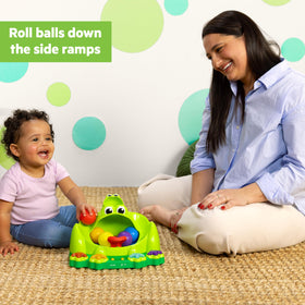 Bright Starts Poppin Ball Frog toy battery compartment for quick setup