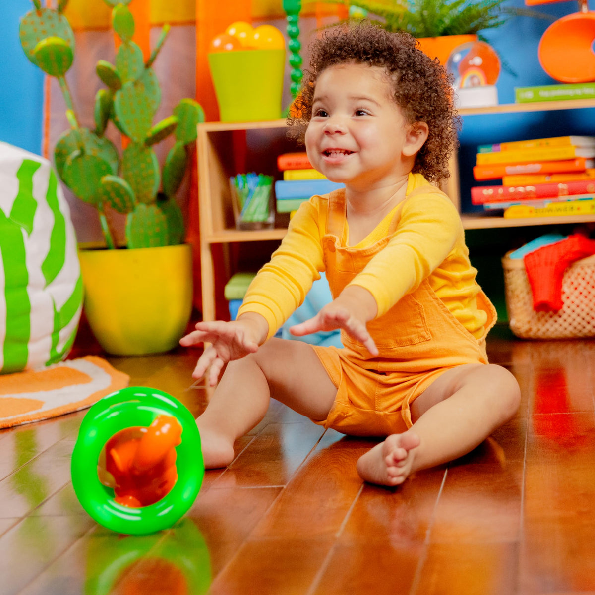 Bright Starts Roll & Glow Monkey engaging play boosts giggles.