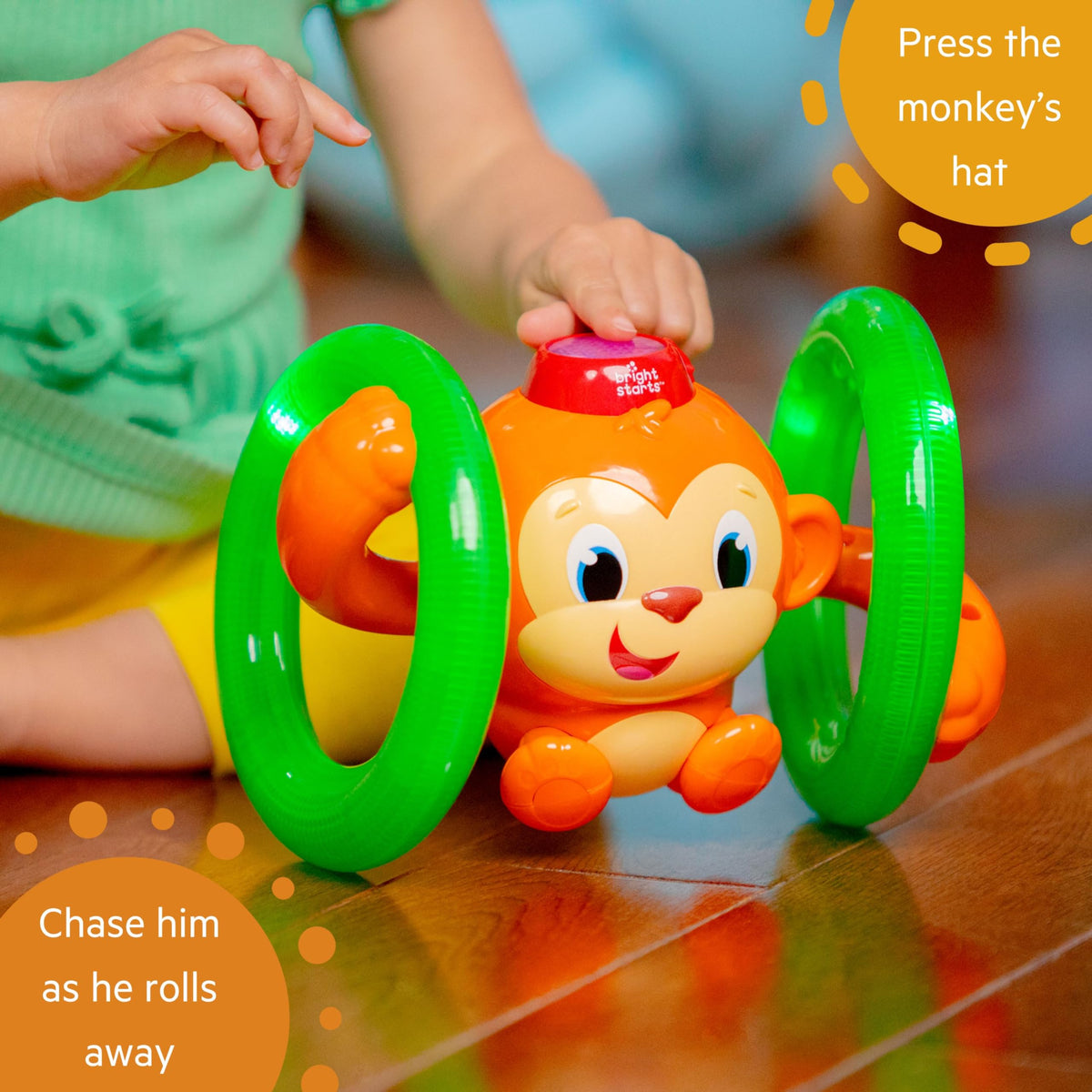 Bright Starts Roll & Glow Monkey rolling path showcases dynamic play.