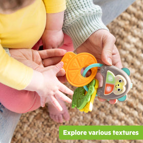 Bright Starts textured fruit keys soothe tactile exploration and reaching