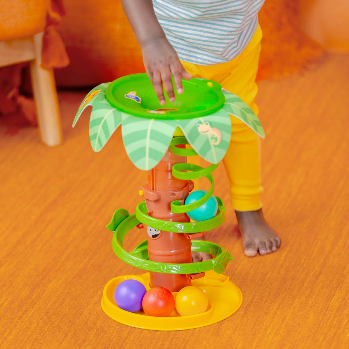 Bright Starts Tropical Twirl Ball Play Toy includes five balls for playtime