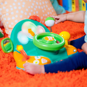 Bright Starts turn signals and odometer invite kids to imagine driving scenarios