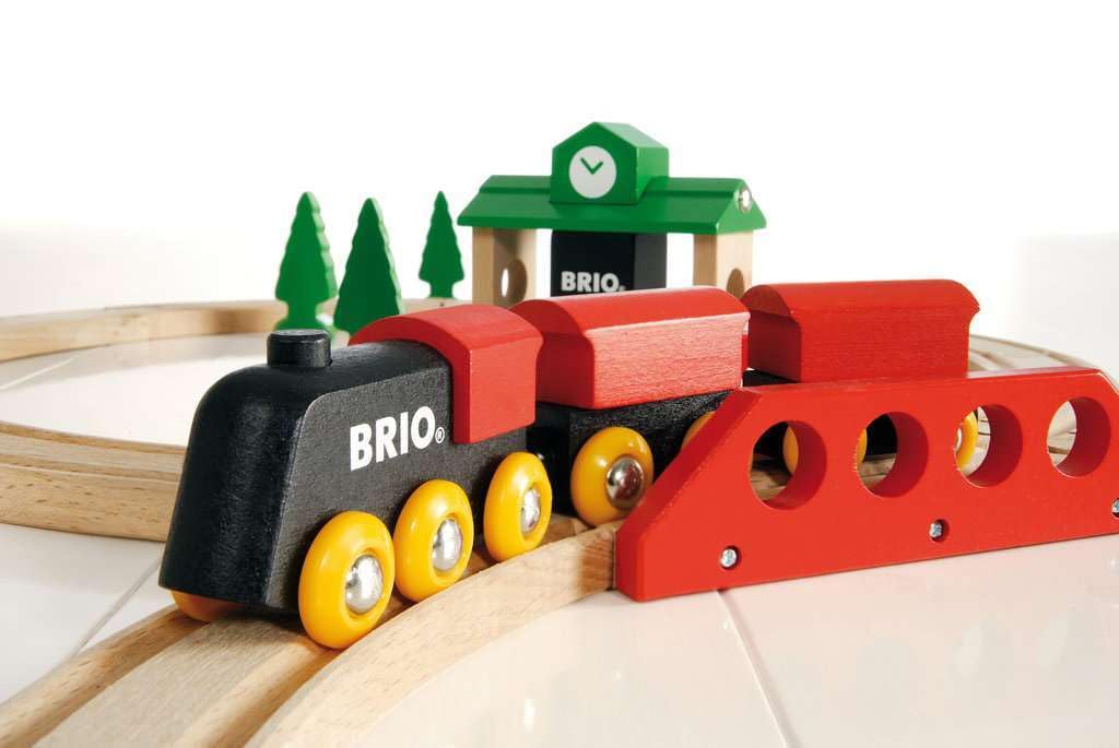 BRIO Classic Figure 8 set depot station with durable wood for learning through pretend visits.