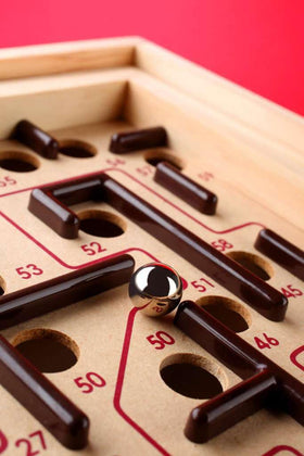 BRIO Labyrinth steel ball navigating toward finish for concentration.