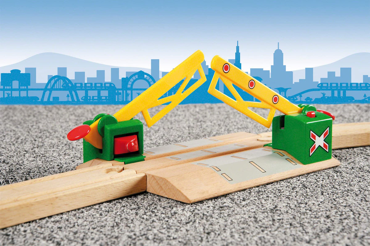 BRIO Magnetic Action Crossing train pass shows passing train triggering hand-eye coordination.