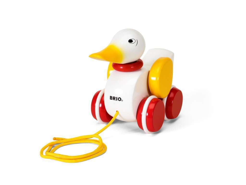 BRIO pull-along duck with red wheels gliding on any floor.