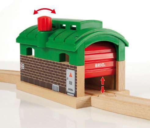 Open doors showcase a resting space for trains in BRIO World