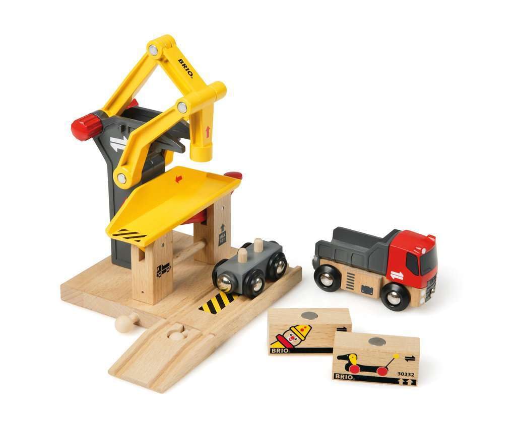 BRIO World magnetic crane demonstrates precise loading during pretend shipments