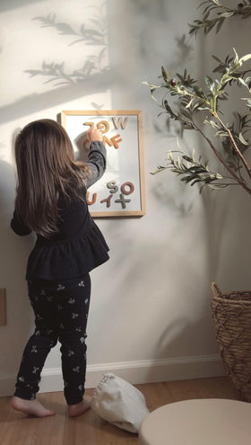 Brooklyn Neutral learning setup on fridge and board inspires creative activities