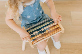 Brooklyn Neutral neutral boho nursery decor that doubles as a playful math activity.