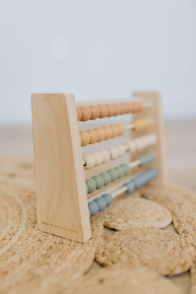 Brooklyn Neutral wooden toy suitable as a gender-neutral gift for growing minds.