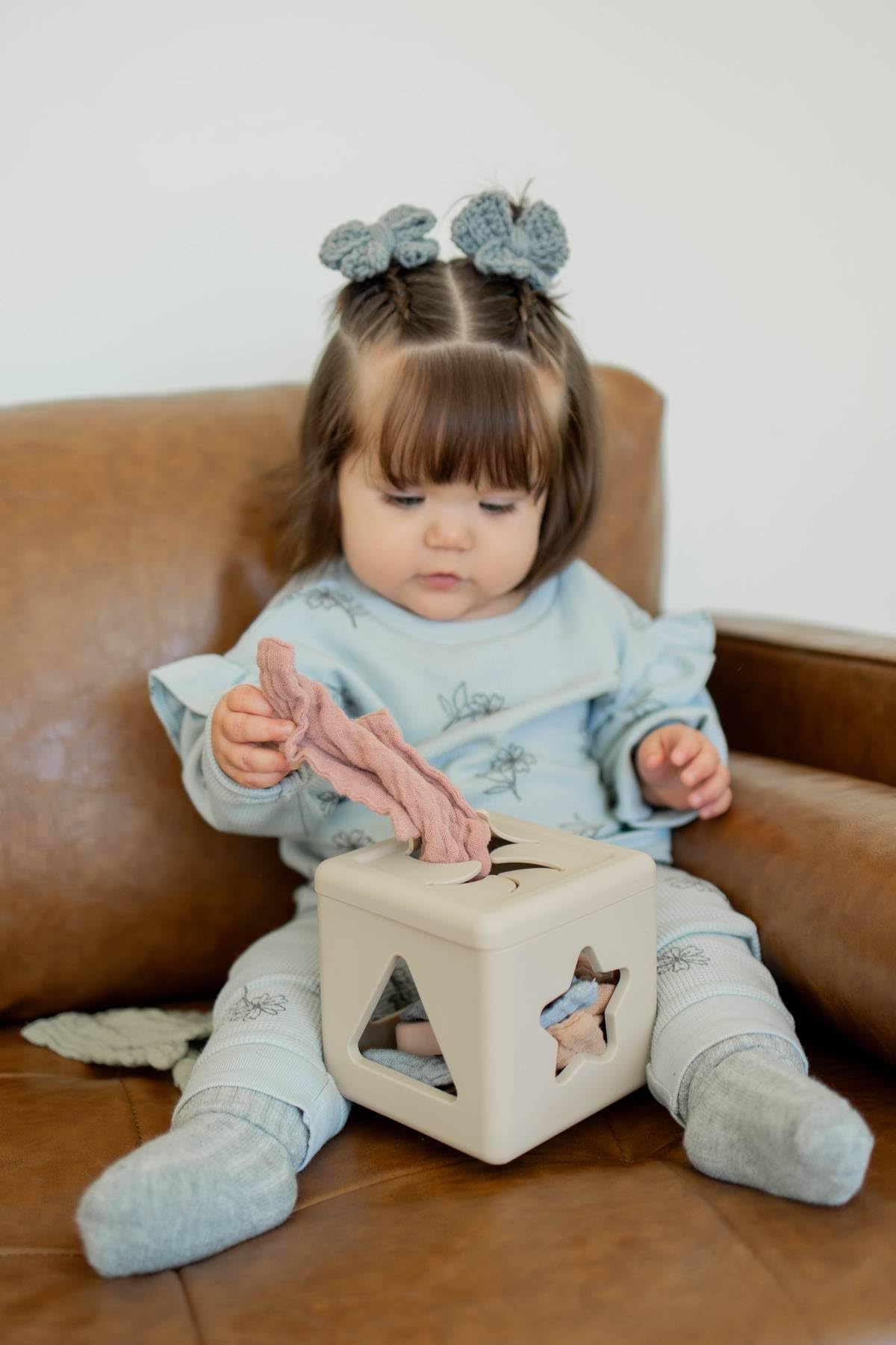 Brooklyn Neutral silicone shape sorter star promotes problem-solving