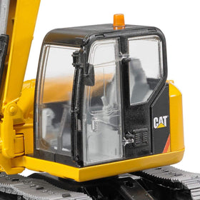 Bruder 02457 CAT mini excavator 62-link tracks for durability in sand and soil.
