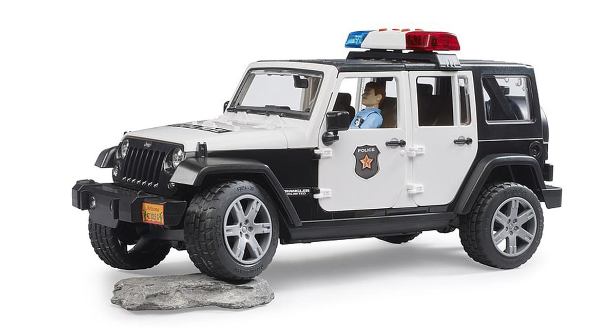 Bruder bworld police figure seated inside for immersive scenes.