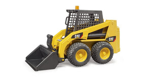 Bruder CAT skid steer loader tread tires on a pretend work site.