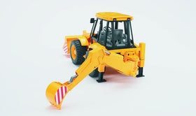 Bruder JCB 4CX Loader Backhoe side dig demonstrates digging action