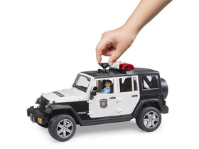 Bruder Jeep Rubicon Police car rugged wheels with off-road suspension for outdoor play.